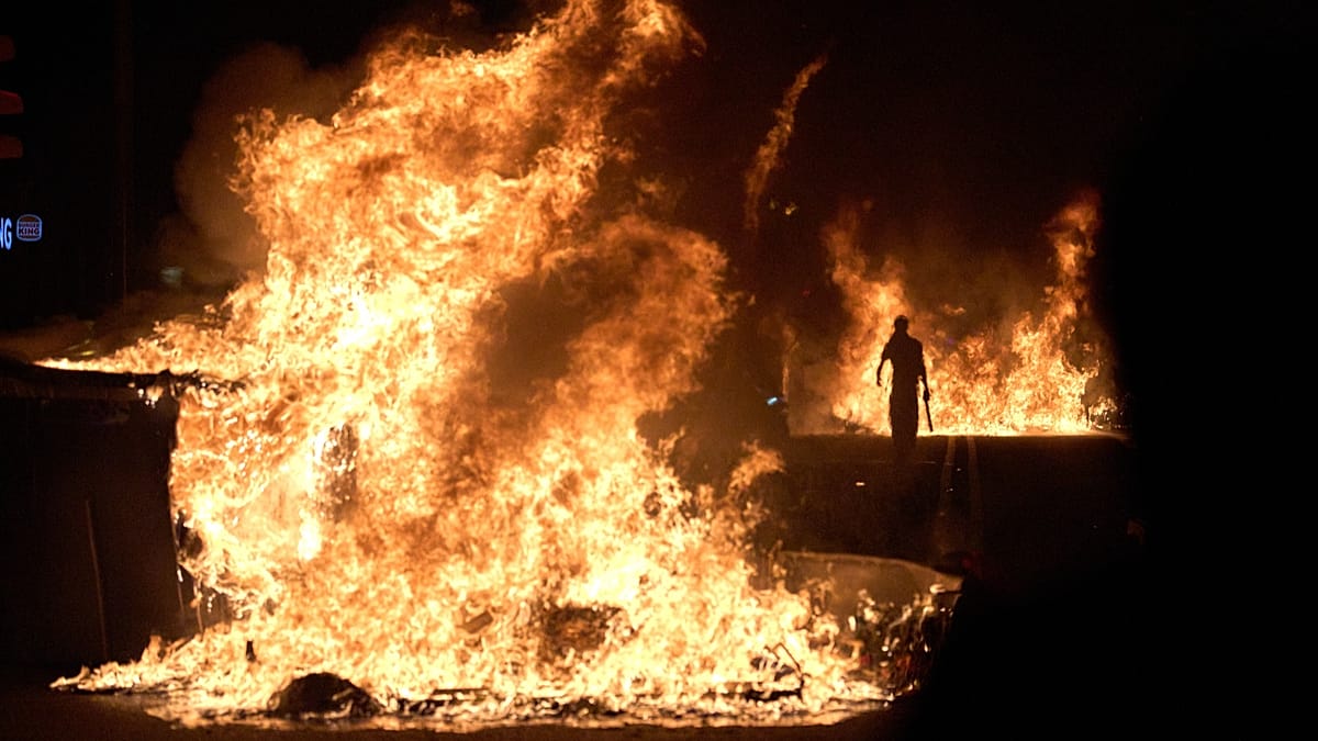 Barcelona housing protest turns violent as police clash with demonstrators