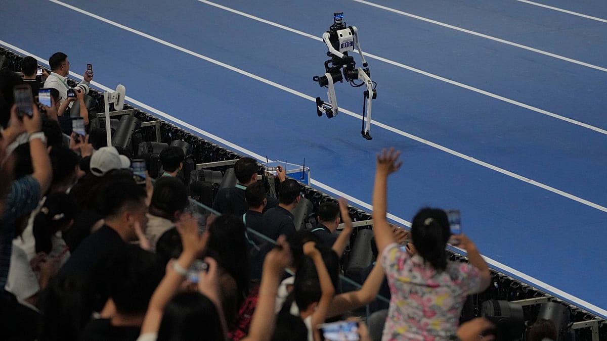 Beijing Robot Games: Humanoids Race, Play Football, and Practice Tai Chi