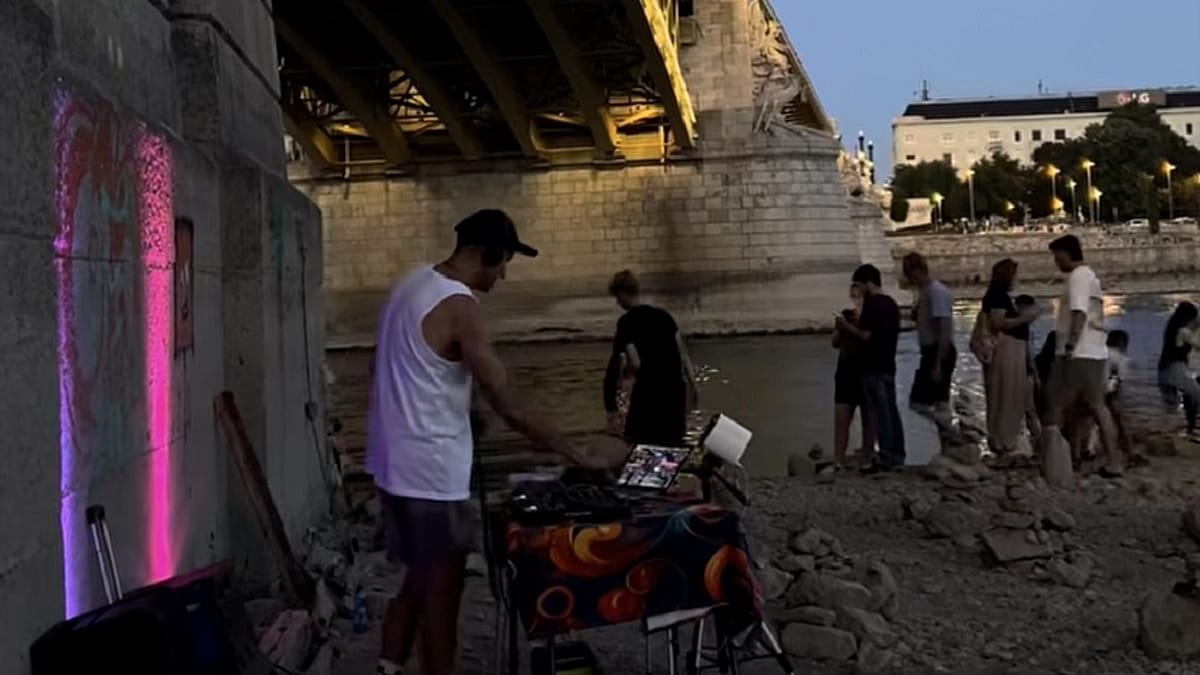 Budapest's exposed Danube riverbed becomes an unlikely party venue