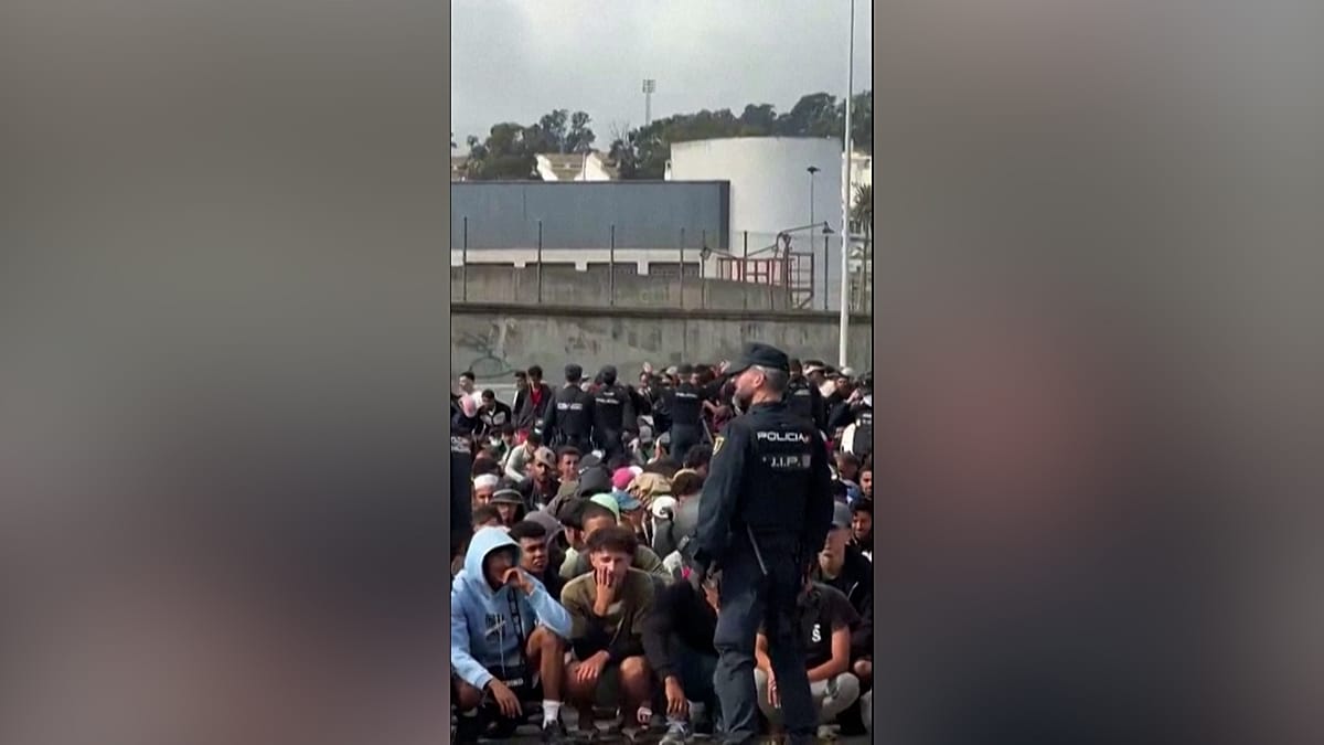 Ceuta migrants rushed to new port camp as Spain struggles to manage surge