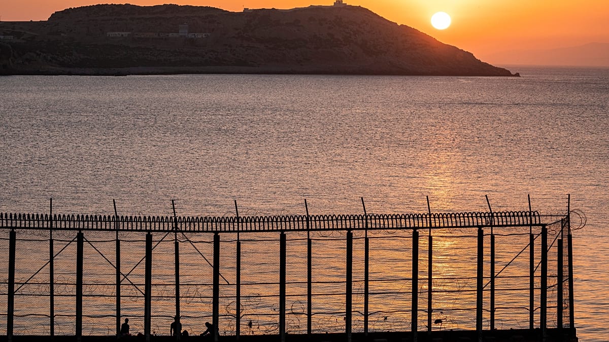Ceuta overwhelmed as hundreds of migrants swim from Morocco