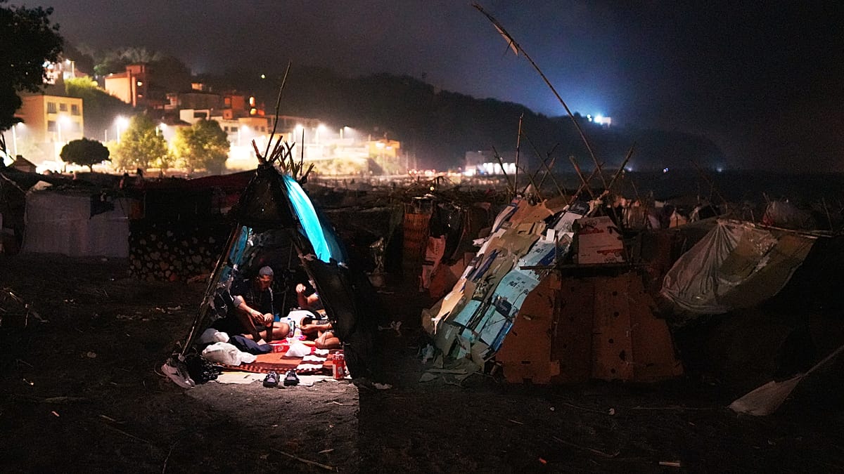 Ceuta's new migrant camp overflows, sending thousands back to beaches