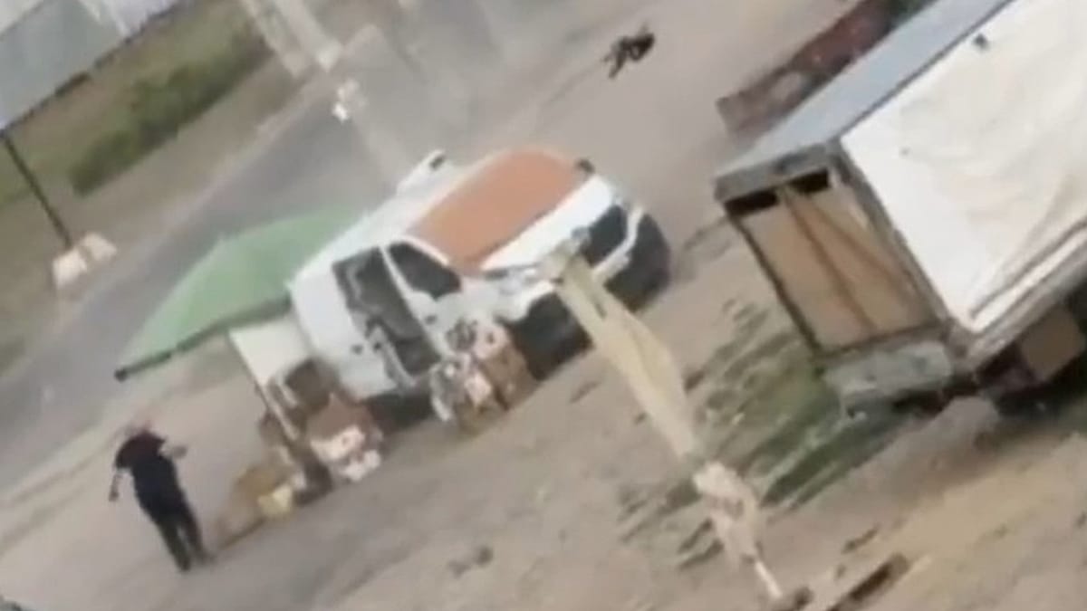 Drone footage shows Russian strike on civilian at Kherson market