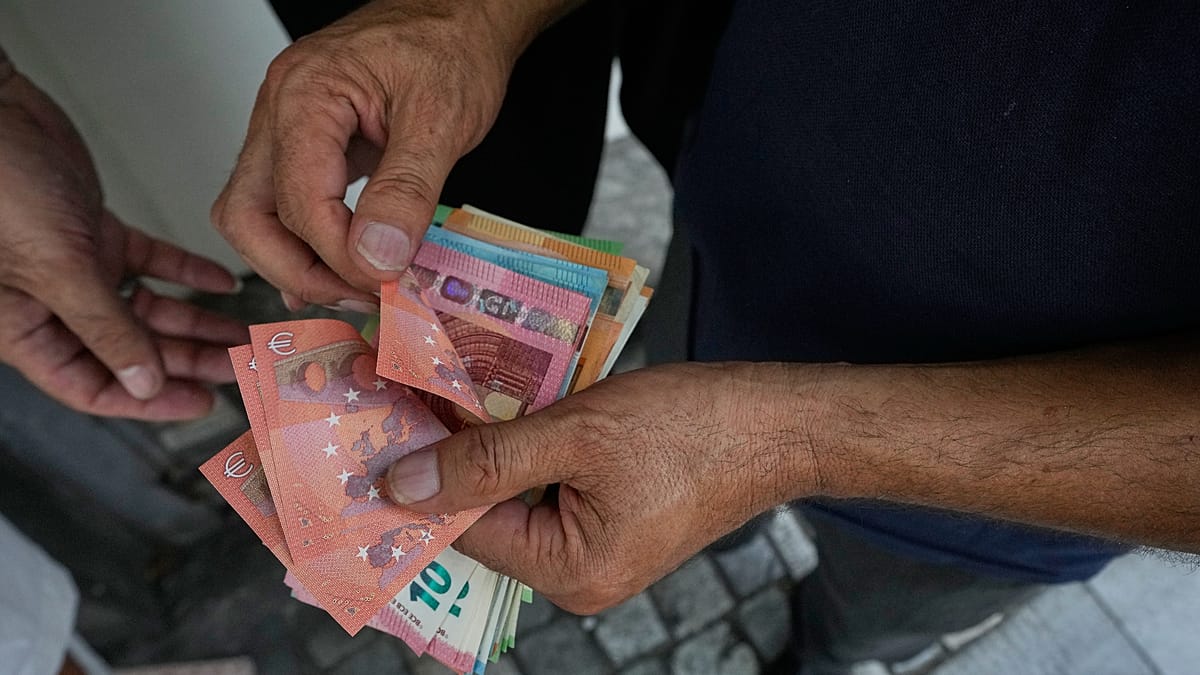 Euro hits new lows against dollar and pound despite ECB rate hikes