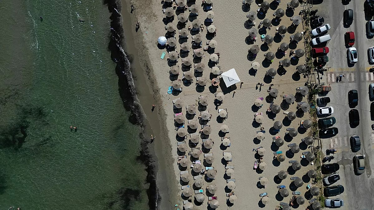 Fatal sunbed dispute on Athens beach highlights Greece's tourism tensions