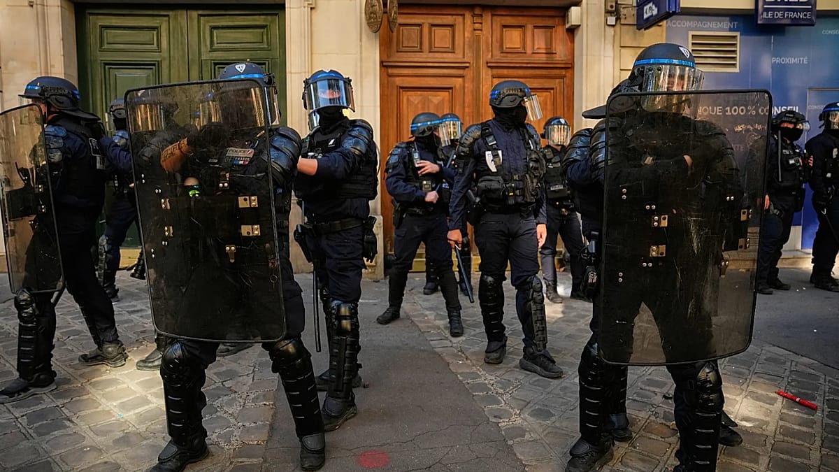 France halts stun grenades at student protests after teen's injury