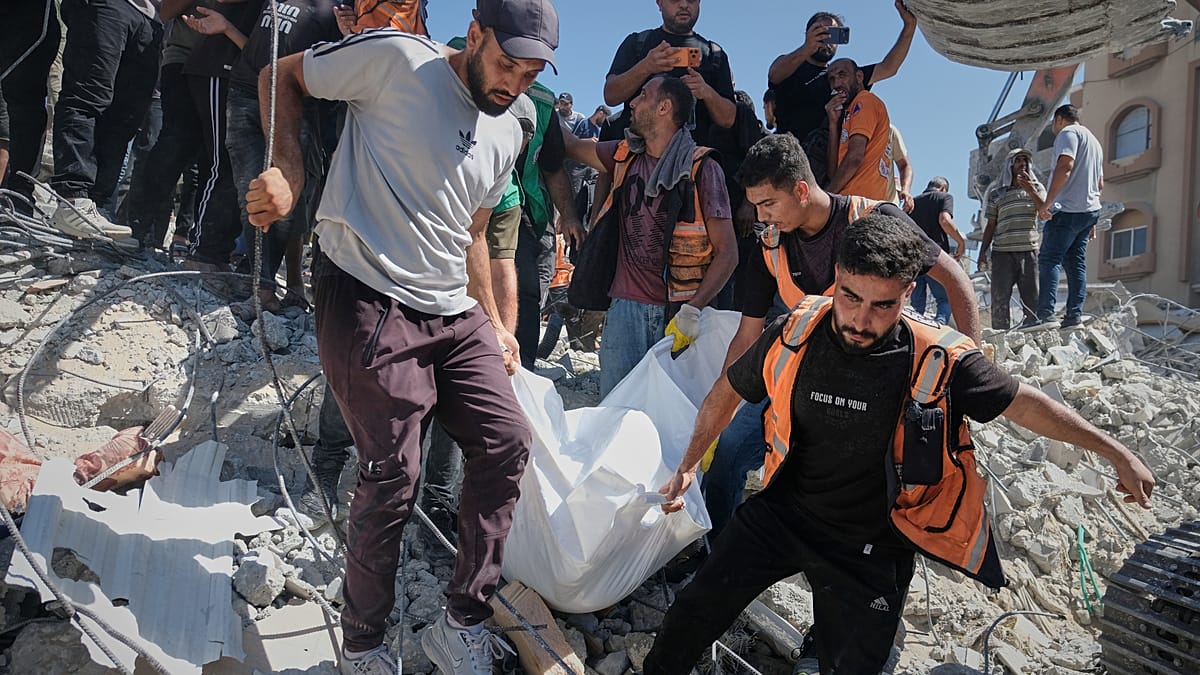Gaza building collapse kills 21, including 11 children, as ceasefire stalls