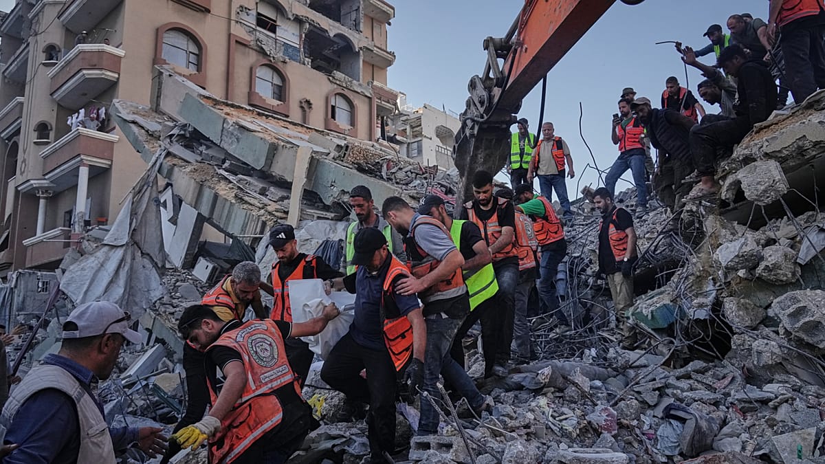 Gaza City building collapse kills at least 12, dozens missing