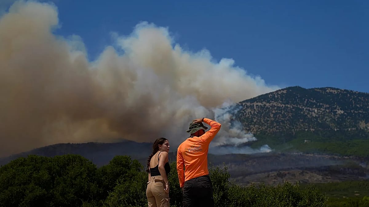 Heatwave forces Spanish toxic alert, French reactor shutdowns, Greek wildfires
