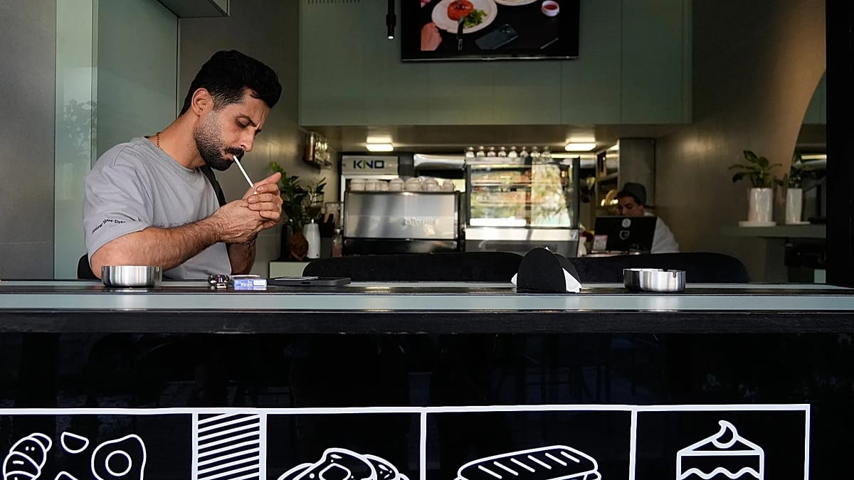 Iranian café chain owner jailed and assets seized over protest support