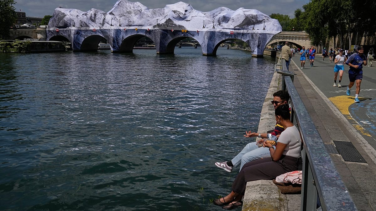 JR's Giant Cave Installation Draws Crowds to Paris's Pont Neuf