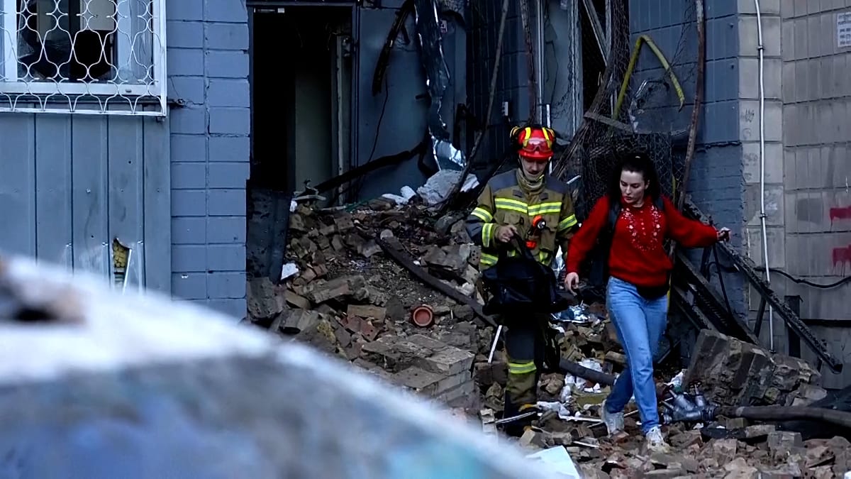 Kyiv rescue efforts under way after overnight Russian missile strikes kill at least 12