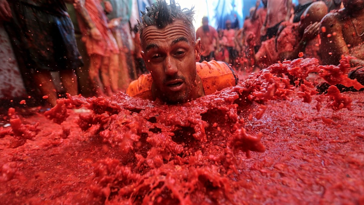 La Tomatina 2026: Buñol's streets turn red as 20,000 join tomato battle