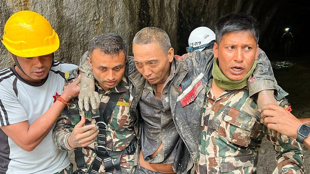 Nepal rescue teams pull two survivors from rubble ten days after floods