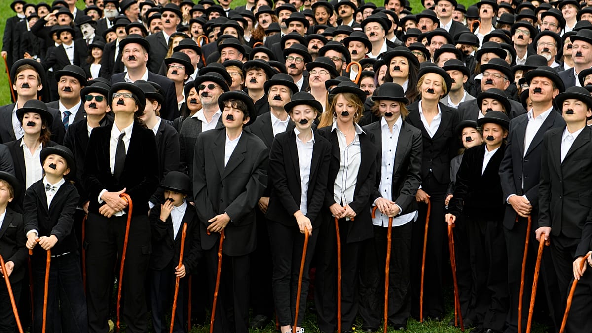 Over 400 Charlie Chaplin Impersonators Attempt World Record in Switzerland