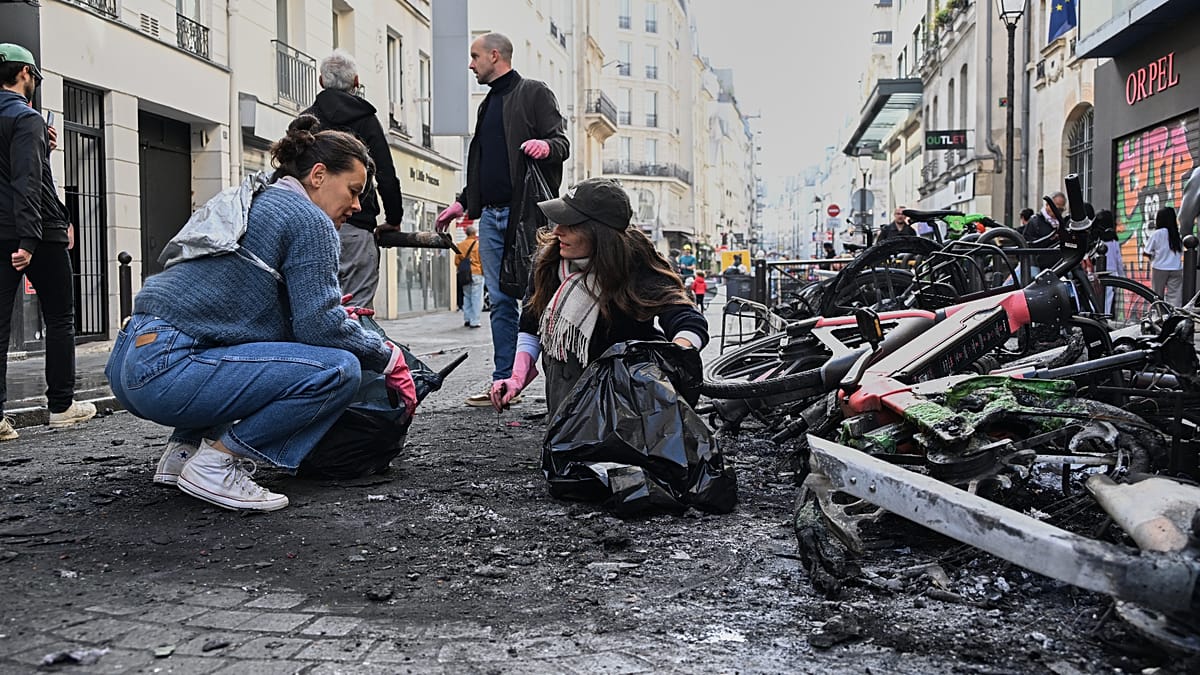 Paris cleans up after cost-of-living protests turn violent