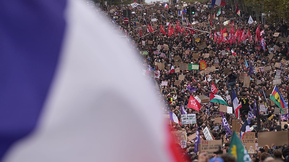 Paris protests draw hundreds of thousands amid tight security and arrests