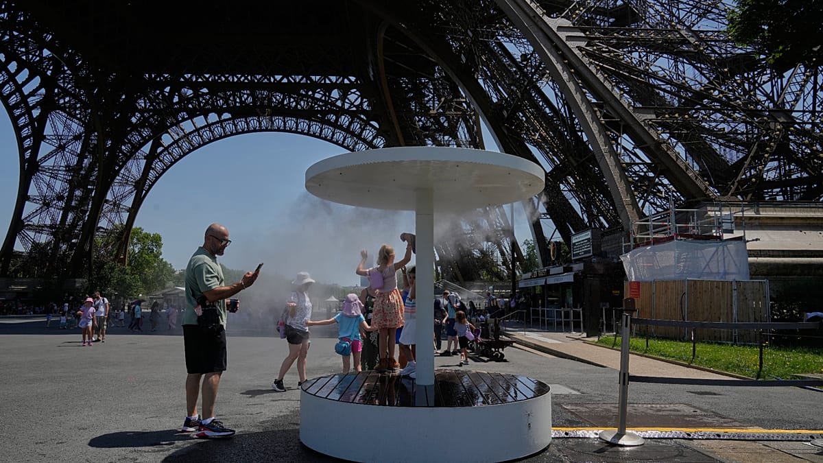 Parisians Flock to Canal Saint-Martin as Heatwave Sends Temperatures Soaring