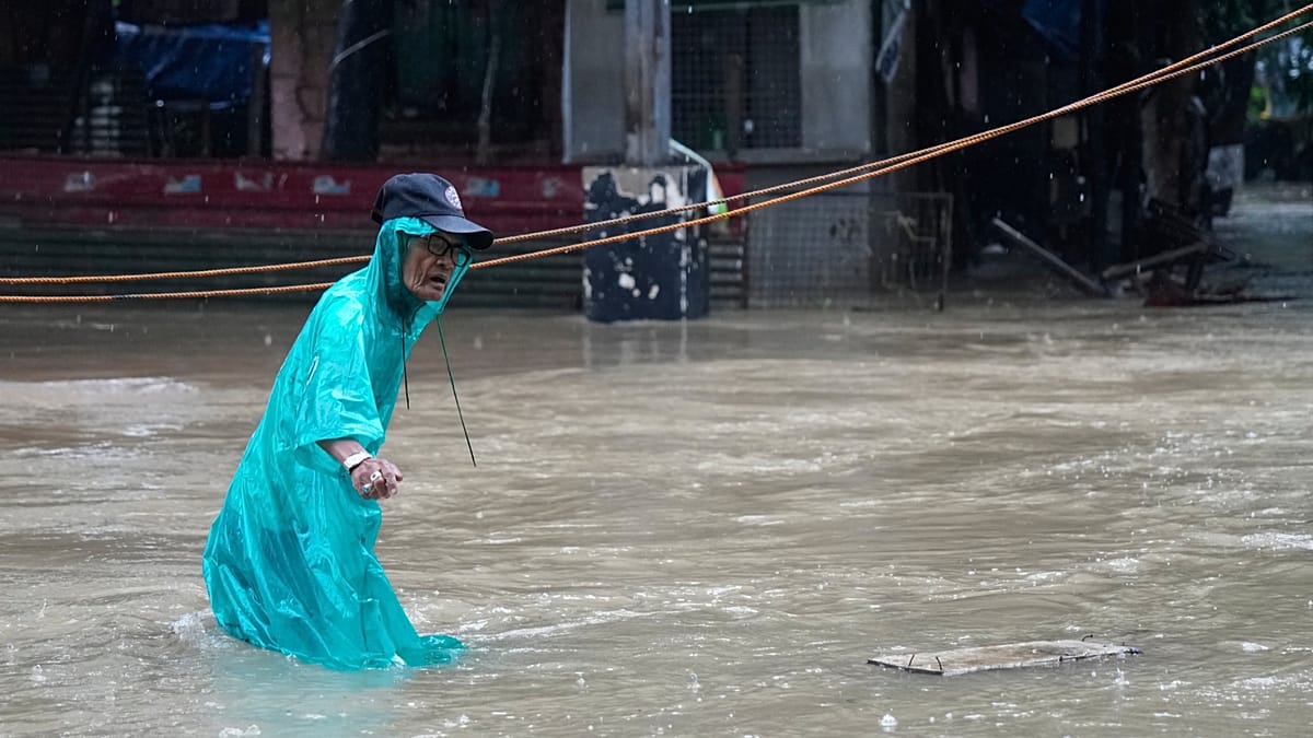 Philippines monsoon floods kill at least 13, rescuers search for missing