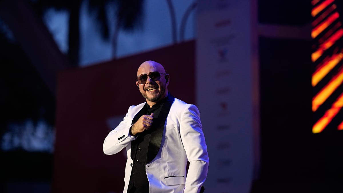 Pitbull Fans in London Set Guinness Record for Bald Cap Gathering