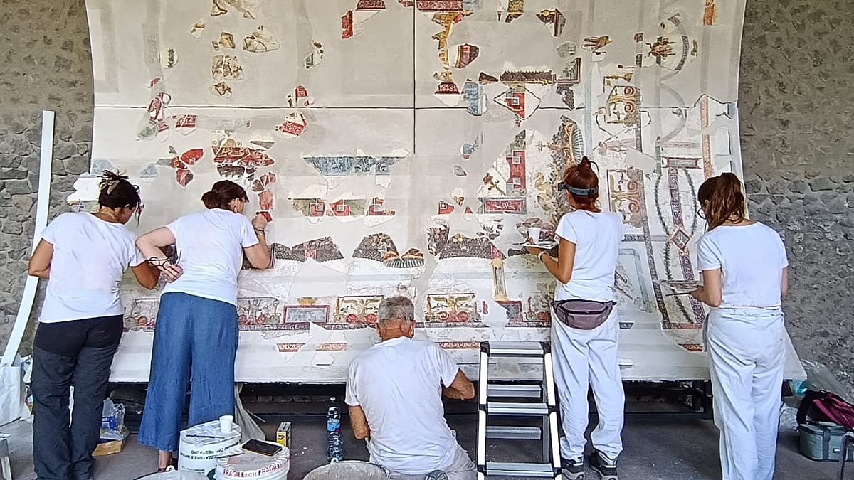 Pompeii restorers reconstruct frescoed banquet hall ceiling with Dionysus myth