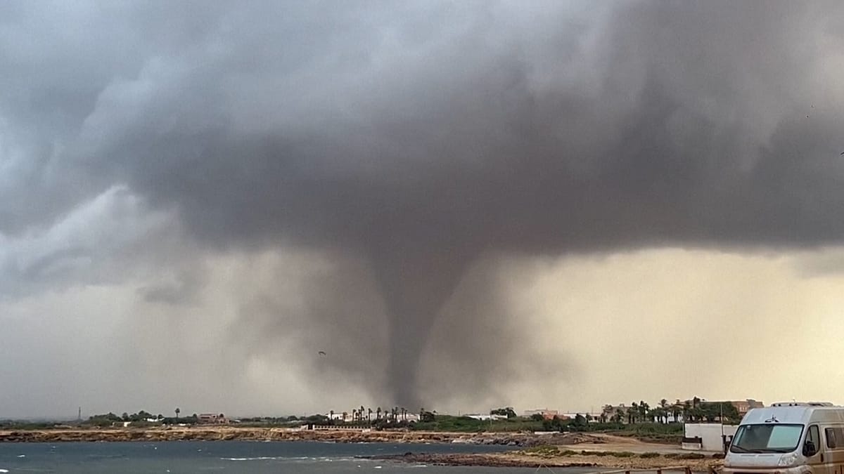 Rare twin waterspouts batter western Sicily, damaging homes and a school
