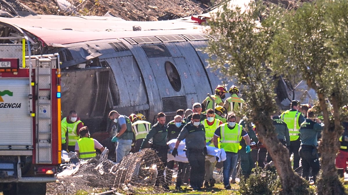 Rescuers comb mangled wreckage after deadly high-speed train crash near Toledo