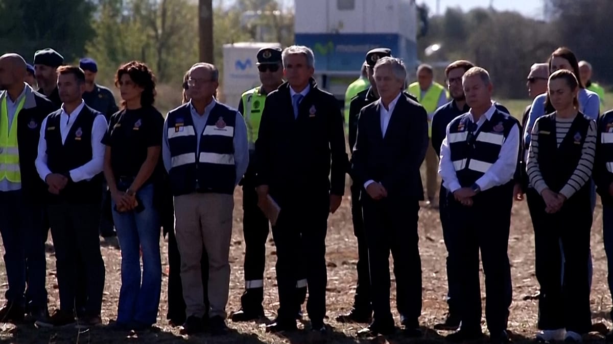 Spain holds minute of silence for 69 train crash victims as King visits wounded