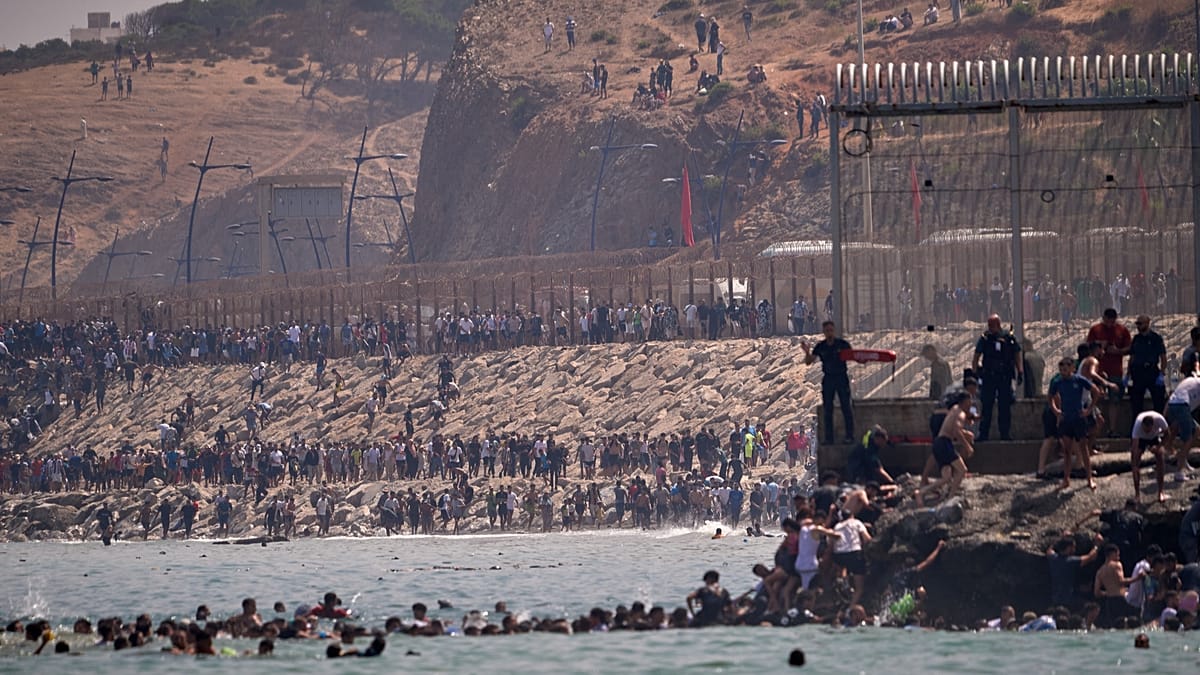 Spain orders probe into claim Moroccan forces guided Ceuta migrant surge