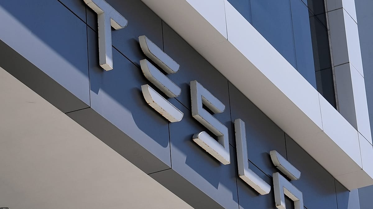 Tesla profit slides as Musk weighs SpaceX merger