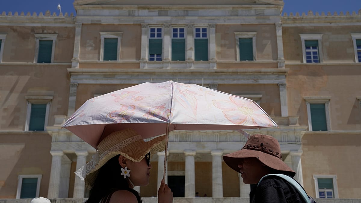 Tourists in Greece embrace hats and shade as heat awareness grows