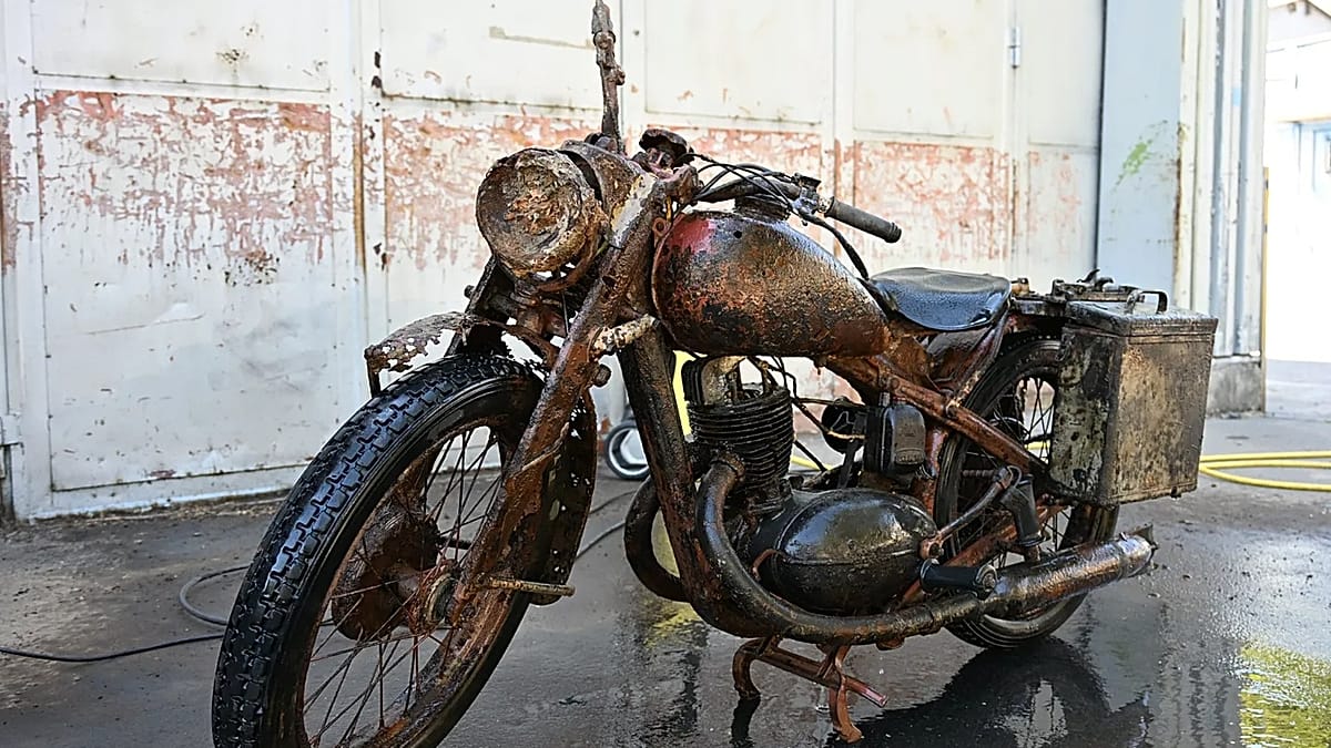 Well-preserved WWII motorbike and soldiers' remains emerge from Danube