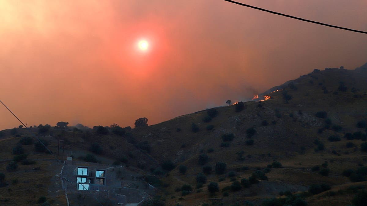 Wildfire rages out of control in southern Crete, two firefighters dead