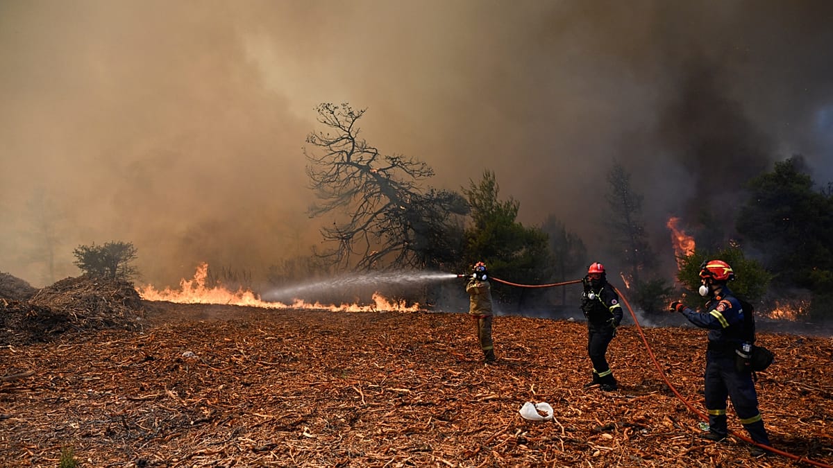 Wildfire west of Athens forces evacuations as winds intensify
