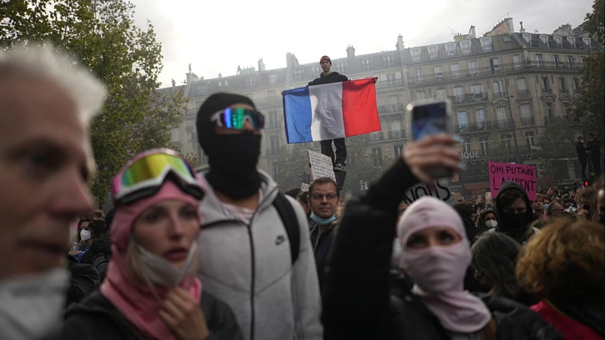 Yellow vests and students merge in Paris protest over living costs